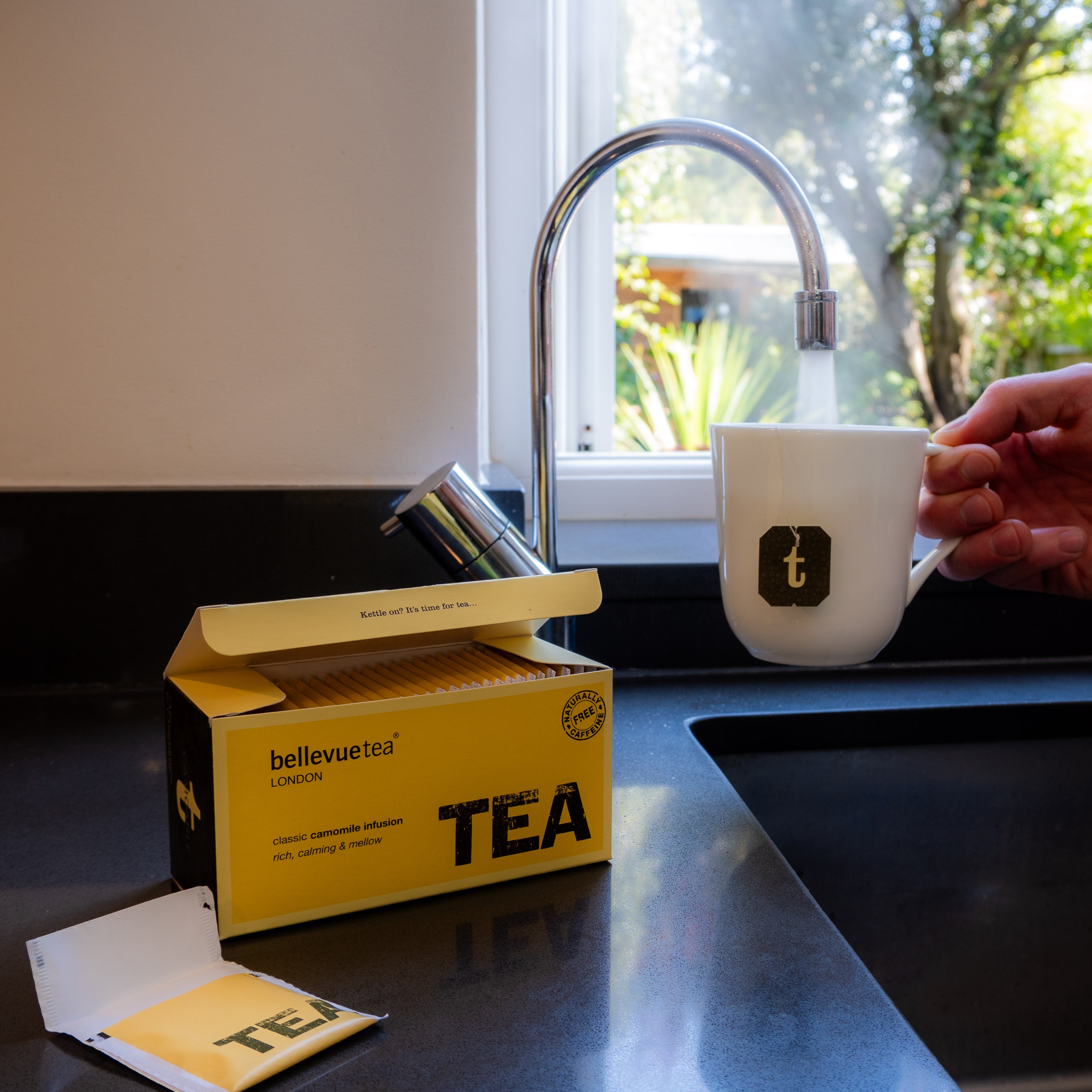 Cup of Bellevue Tea Camomile Infusion Being Poured – Caffeine-Free Calming Herbal Tea