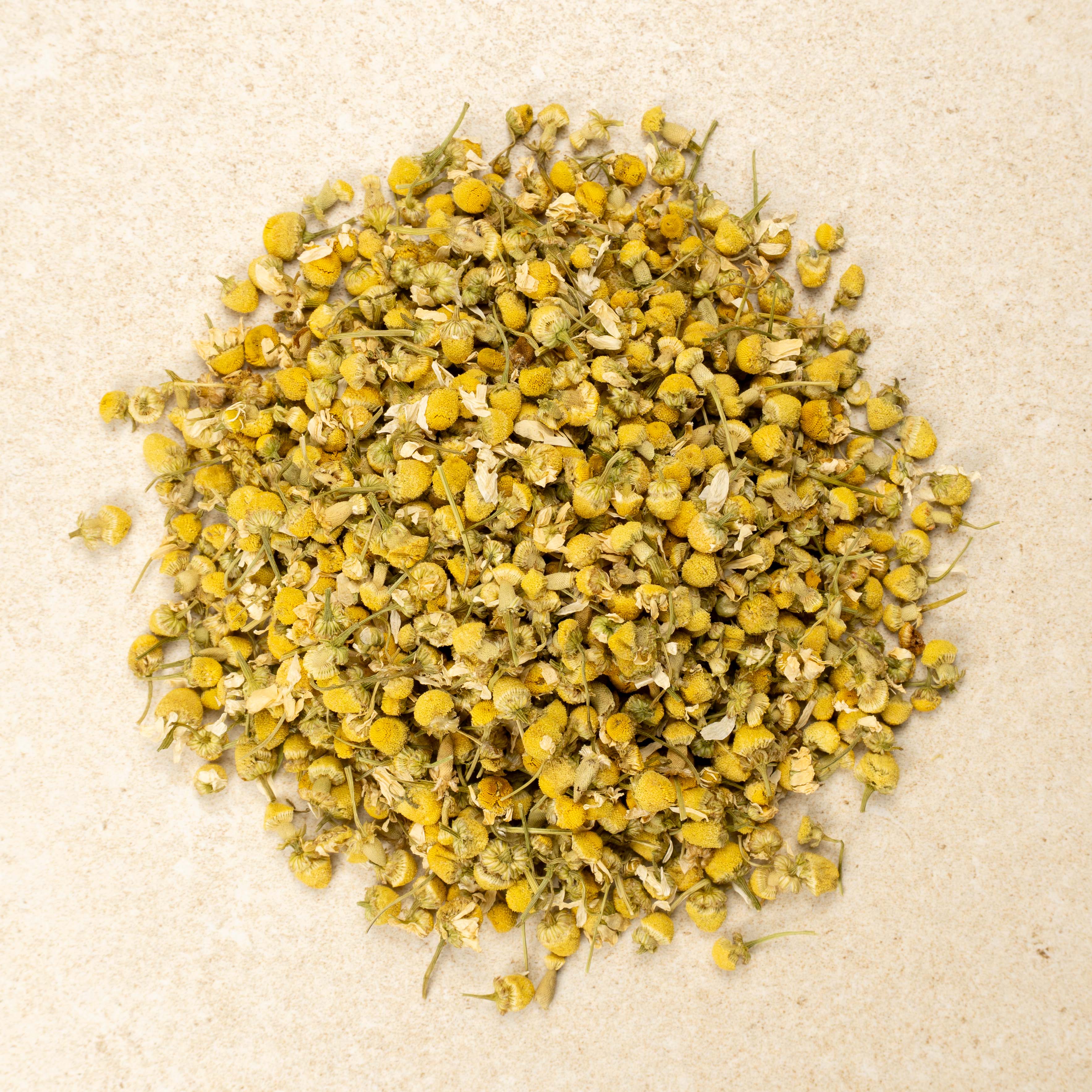 Bellevue Tea whole Egyptian camomile flowers, overhead view of the dried loose leaf