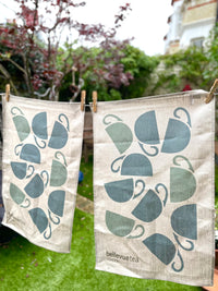 large natural linen tea towel with hanging loop